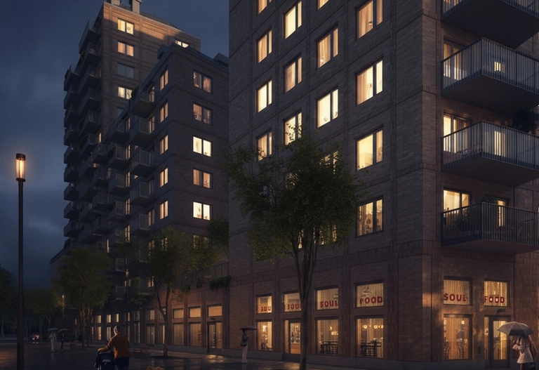 Hus i kvällsljus med belysning i lägenheter.